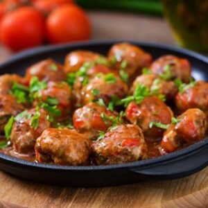 chicken meatballs breaded and ready to be fried